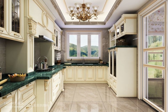 Opulent and Refined Custom Stainless Steel Kitchen Cabinetry with Deep Green Marble Countertop and Soft-Close Doors